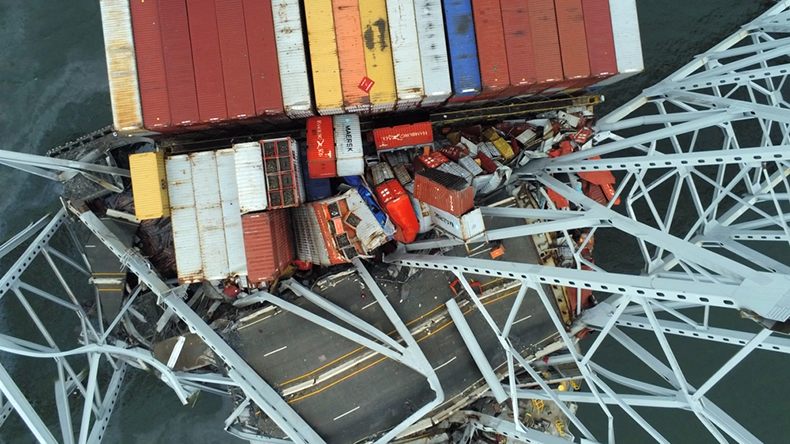 Aerial view of containership Dali with crushed boxes and Baltimore bridge