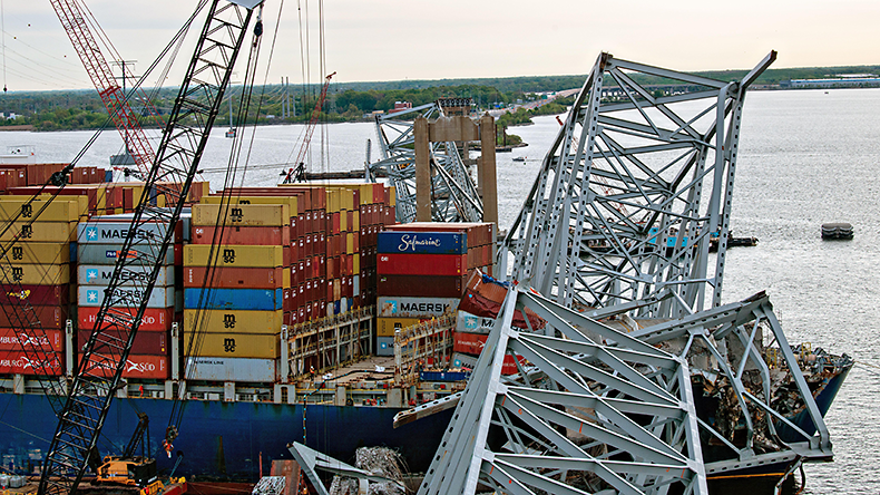 Crane barges lift wreckage of the collapsed Francis Scott Key Bridge and cargo containers from Dali containership