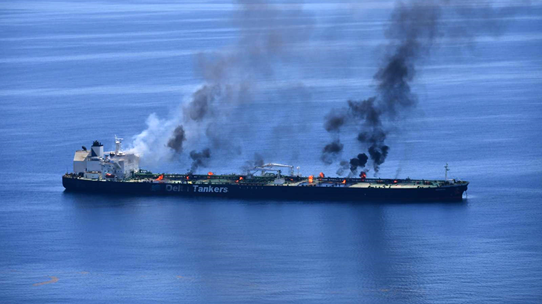 Sounion tanker at sea showing deck with flames and black smoke 