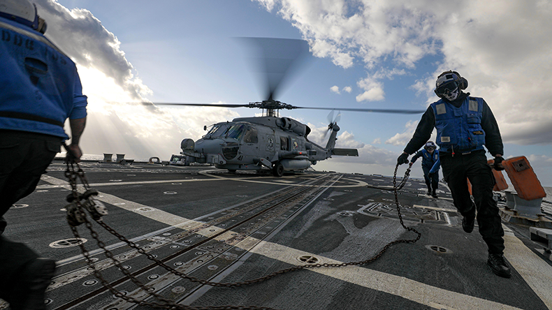 Sailors aboard the Arleigh Burke-class guided-missile destroyer USS Dewey Dec 2023
